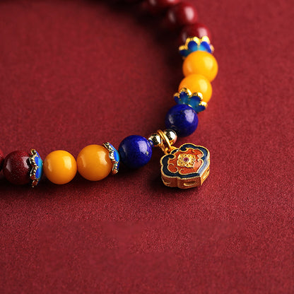 Cinnabar Bracelet with Enamel Longevity Lock, Lapis Lazuli, and Amber – Luck, Health, and Prosperity
